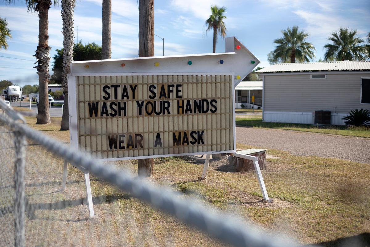 A sign urges resident to stay safe during the COVID-19 pandemic in Hidalgo County. Dec. 7, 2020.