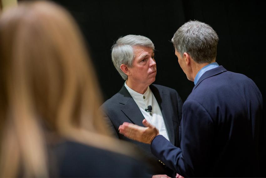David Barton, left, of WallBuilders talks with a delegate as he poses for photos at a Texas Eagle Forum reception at the Texas Republican Convention in Fort Worth on June 7, 2012.