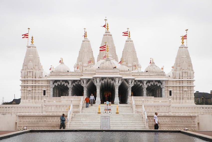 BAPS Shri Swaminarayan Mandir, a Hindu temple in Stafford, is surrounded by apartments and suburban homes.