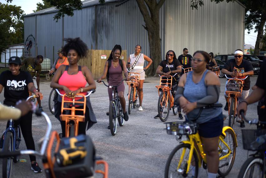 Bike riders listened to instructions before a Juneteenth bike ride  in Houston on June 18, 2021.