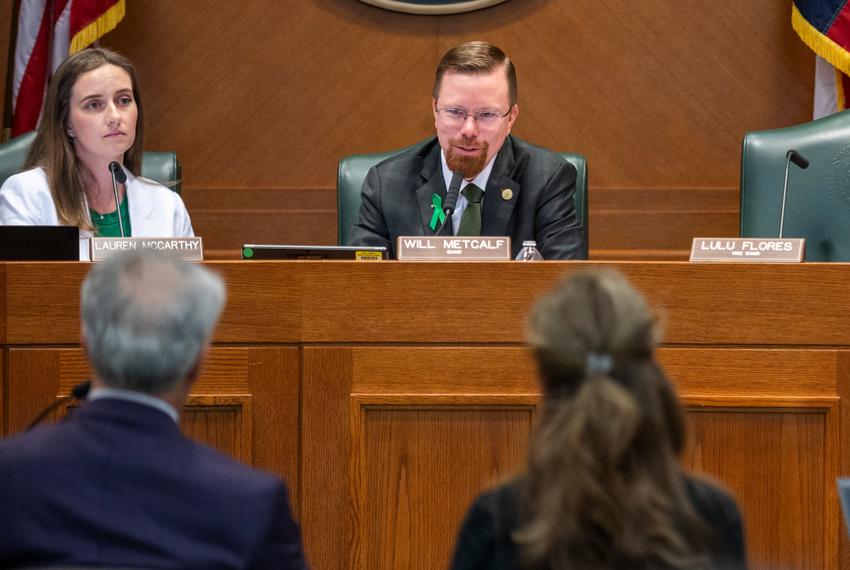 Committee Chair Will Metcalf R-Conroe speak with  Stephen Baskin, onwer of Camp Champions and Meg Clark, owner of Camp Waldemar during a committee hearing Wednesday, Aug. 6, 2025 in Austin, Texas.