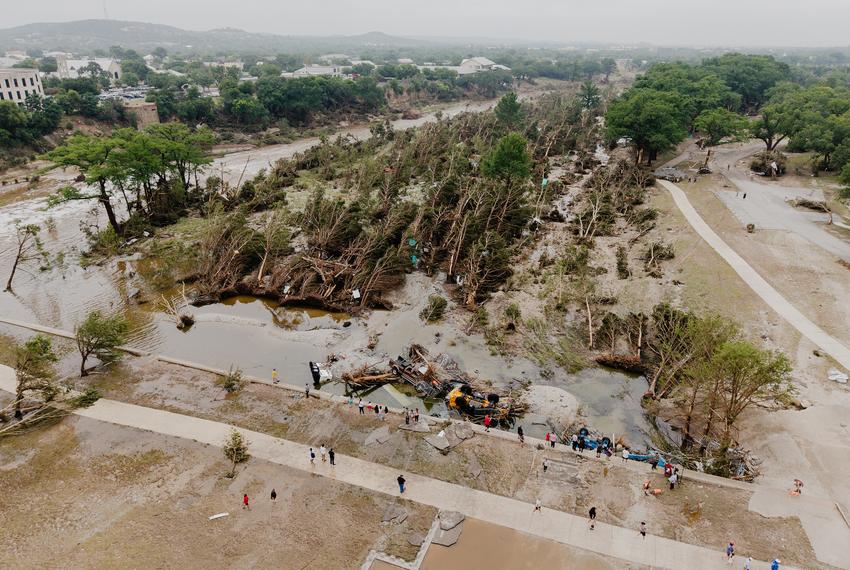 Community members look at the damage caused by the flood at Louise Hays Park in Kerrville on July 5, 2025.