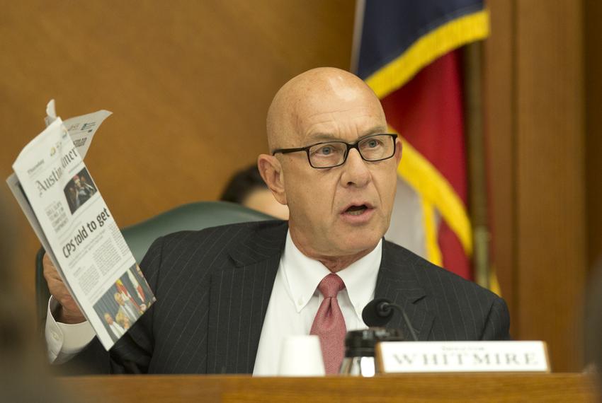 Sen. John Whitmire D-Houston holds up a copy of newspaper with an article regarding CPS on the front page as he questions John Stephen, a consultant hired to give a report on Texas child protective services during an October 26, 2016 Senate Finance Committee hearing