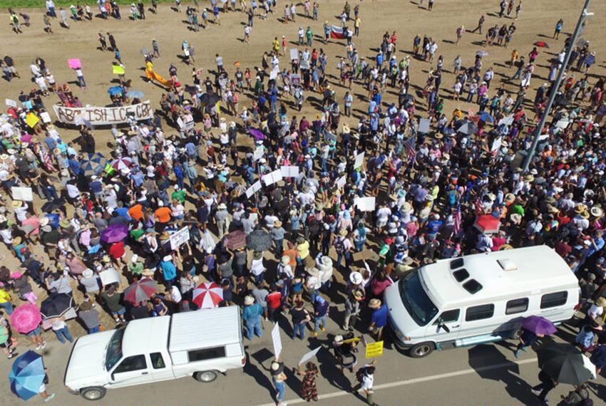 Marchers head towards the tent city at Tornillo Port of Entry to protest the tent city erected there to house children separated from their parents at the border.