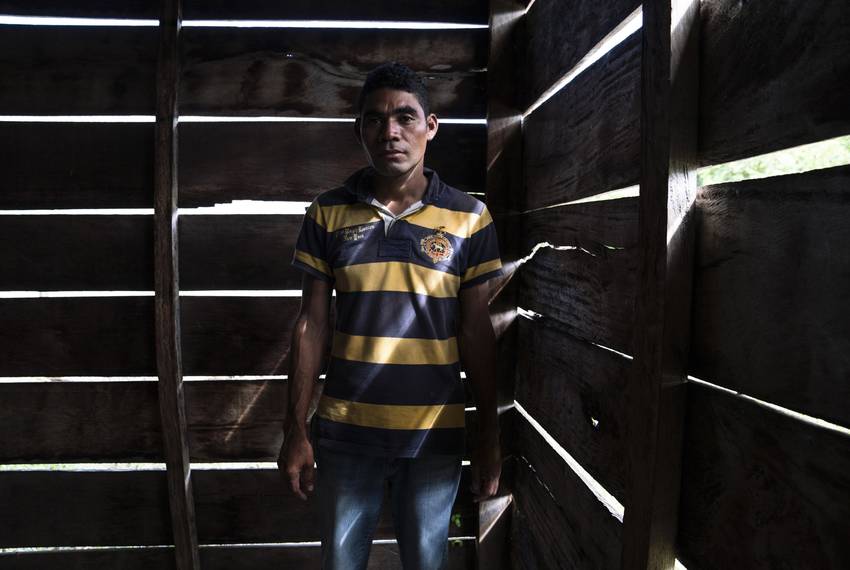 Honduran migrant José, 40, who asked for his last name to be omitted because he fears for his family’s safety, says he traveled with a migrant caravan that started in Honduras with approximately 2,000 people, separate from the one currently traveling through México. He says he can only afford one or two meals per day for his family: "It just breaks my heart when my kids ask, 'Dad, I am hungry, what are we going to eat?'" He adds that he was earning the equivalent of $84 per week and had to pay $42 between two different gangs. José could not afford to support his family with $42 per week. In a migrant shelter in the community Nuevo Francisco León near Palenque, Chiapas on Oct. 23.