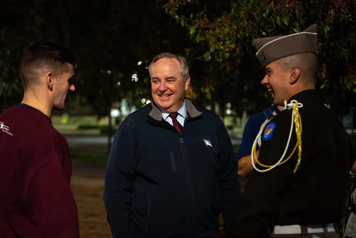Texas A&M interim president Ret. Gen. Mark A. Welsh III speaks with student leaders before addressing the senior class during Elephant Walk on Wednesday, Nov. 15, 2023, at Aggie Park in College Station.
