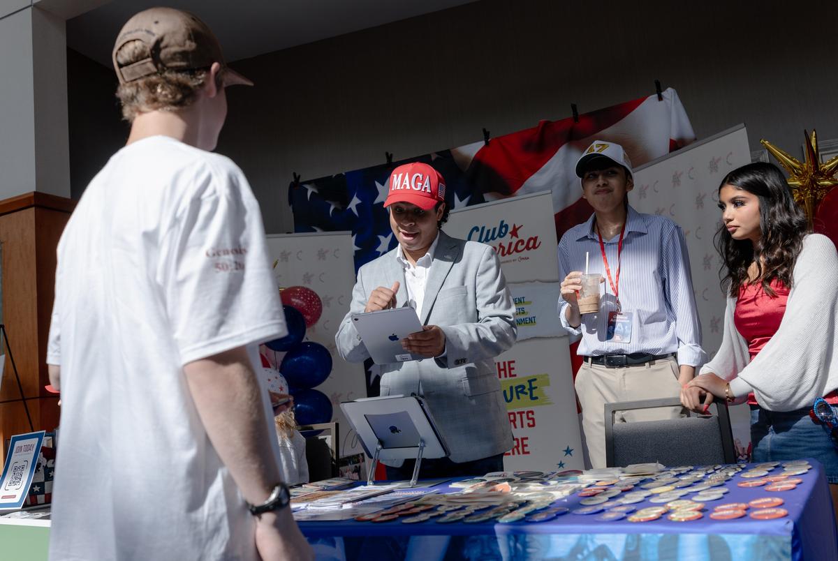 Club America volunteers encourage other high-school aged attendees to start a club, at the Texas Youth Summit at the Woodlands Marriott, Saturday, Sept. 20, 2025, in Houston. (Lexi Parra for The Texas Tribune)