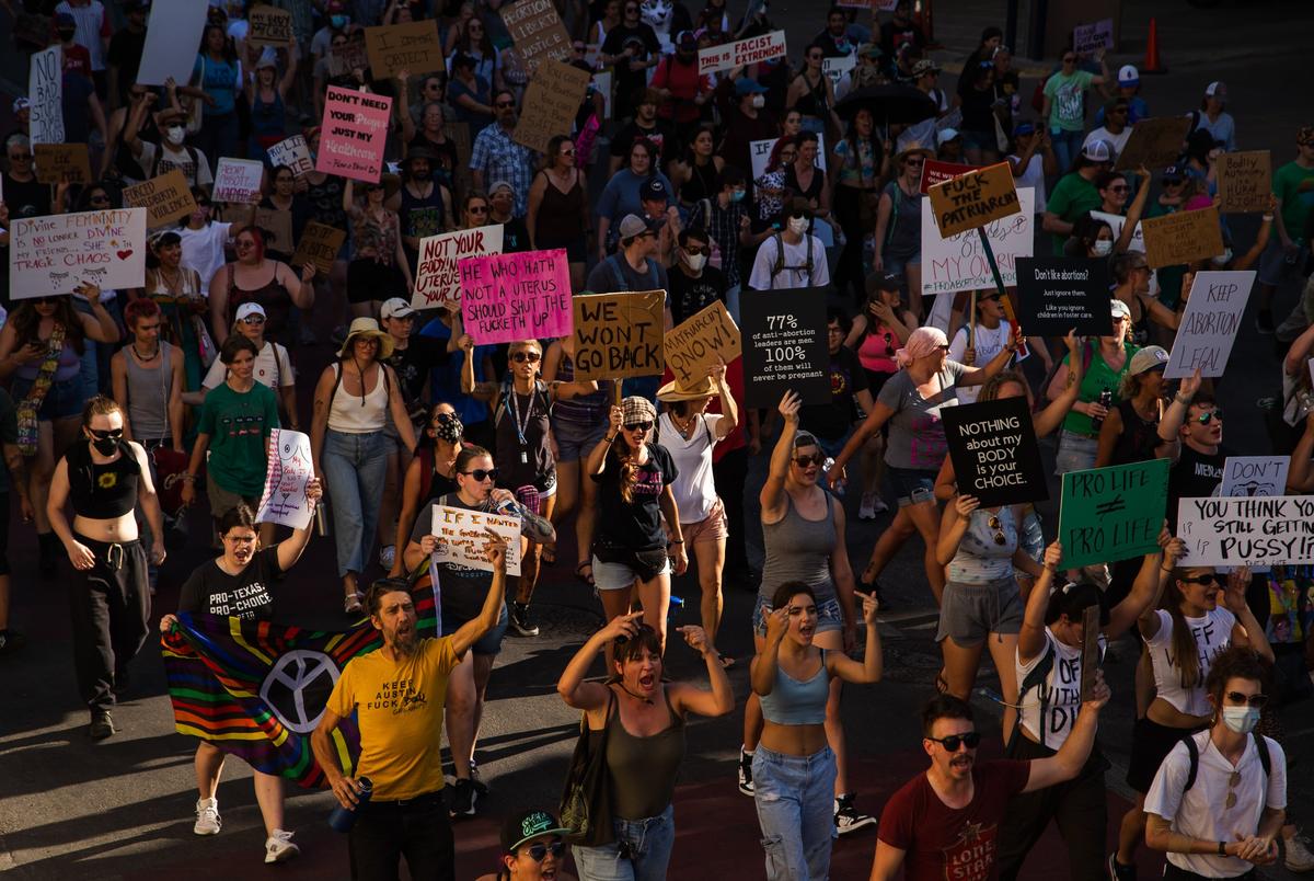 Protesters marched from the federal courthouse to the state Capitol in opposition of the Supreme Court's decision to overturn Roe v Wade in downtown Austin on June 24, 2022.
