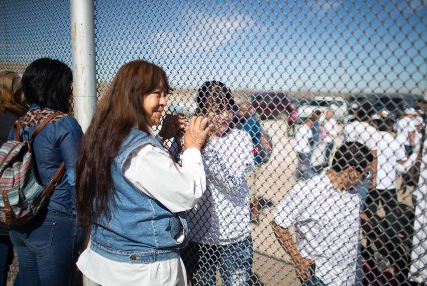 Maria Guadalupe Garcia Rodriguez of Juarez holds the hand of her daughter through the border fence in Juarez, Monday, February 15, 2016. She has not seen her daughter, Linda Rodriguez, since she was 6 months old.