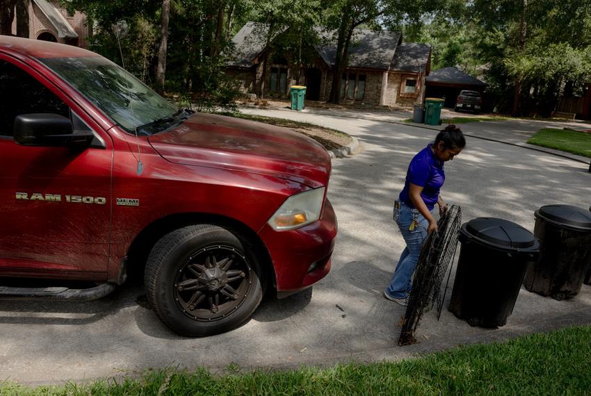 Lisbet Avila visits different client yards to review the work still to be done by her landscaping team, Friday, May 23, 2025, in Houston. 

(Lexi Parra for The Texas Tribune)