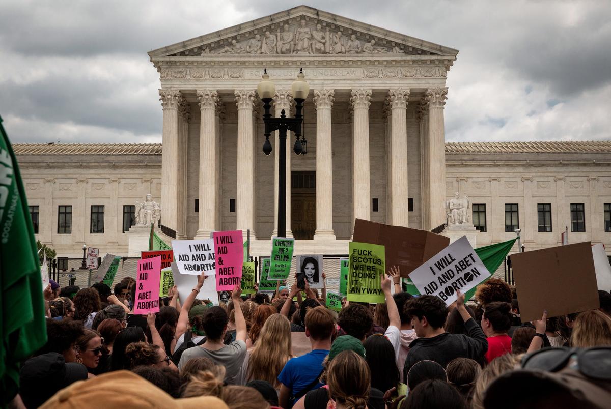Abortion rights demonstrators protest outside the U.S. Supreme Court after the court overturned the landmark Roe v. Wade abortion decision, in Washington, D.C. on June 24, 2022.