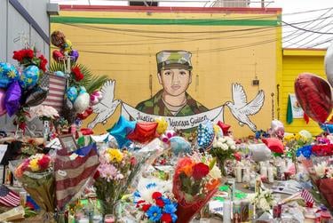 People gather at the mural and growing memorial honoring Spc. Vanessa Guillen at Taqueria del Sol in Houston on July 5, 2020.