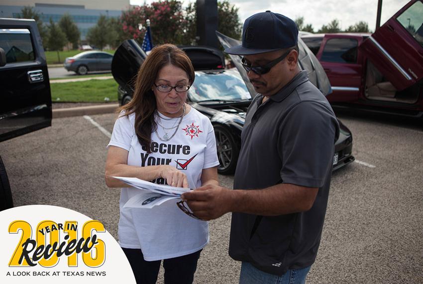 Jill Ramirez, the director of outreach for the Latino Healthcare Forum, passes out flyers and explains components of the Affordable Care Act on Oct. 5, 2013. With Donald Trump's election to the White House, the health law faces an uncertain future.