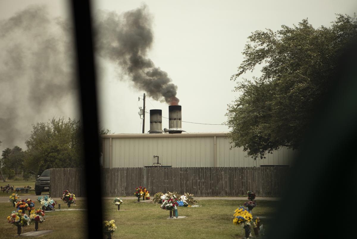 Smoke billows out of a smoke stack at the crematorium at Val Verde Memorial Gardens in Donna. July 17, 2020. 