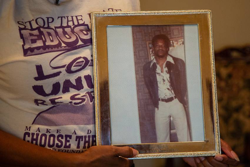 Louvon Harris holds a photo of her brother, James Byrd Jr., at her home in Cypress, Texas. James was murdered in 1998 by three white men, and since then, Louvon has campaigned for hate crime laws in Texas and the rest of the country.