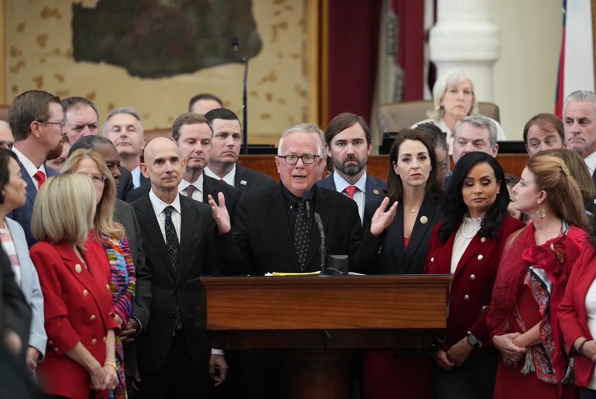 State Rep. Todd Hunter, R-Corpus Christi stands with Republican lawmakers as the Texas House votes to pass a Republican-led, mid-decade redistricting effort that was delayed by a two-week Democratic walkout, on Aug. 20, 2025.