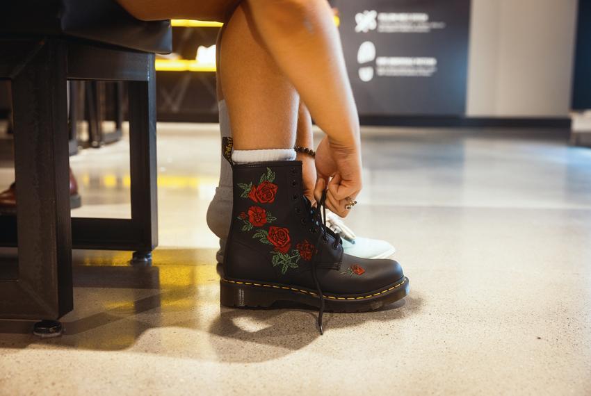 Cass tries on a new pair of combat boots, preparing for the new school year at the Mall of America in Minneapolis, MN on September 05, 2022