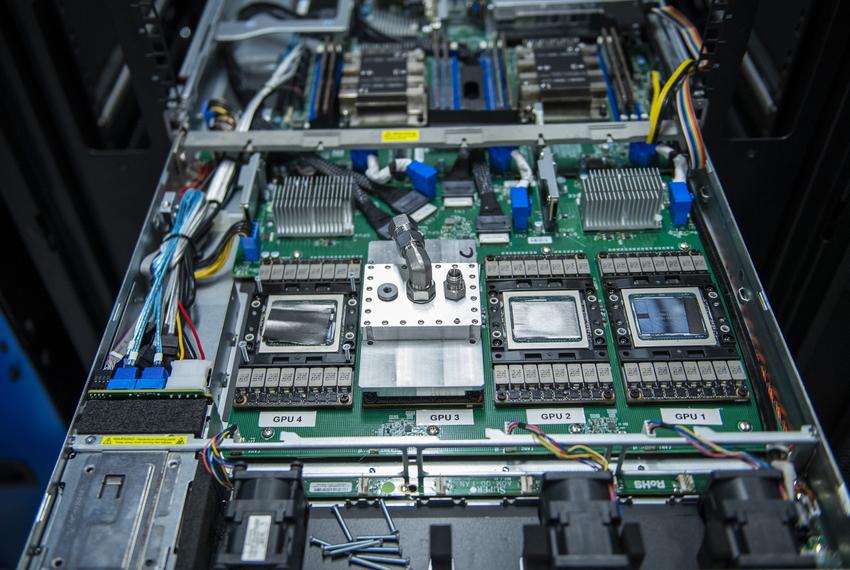 A  Supermicro SYS-1029GQ-TVRT with a cold plate on top of a Graphics Processing Unit sits in a sever rack at The University of Texas at Arlington on Friday, Sept. 12, 2025 in Arlington, Texas. The supermicro was orginally cooled with a fans but are being adapted to use liquid cooling.