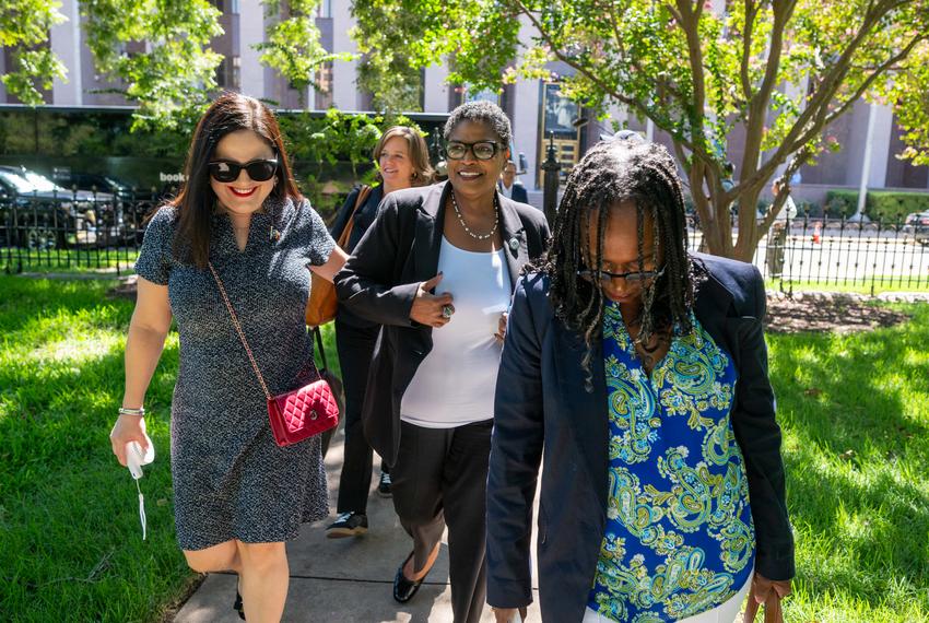 Texas Democrats Rep. Ana Hernandez, D-Houston, Toni Rose, D-Dallas and Sheryl Cole, D-Austin, r, get off a charter bus from the Austin airport outside the State Archives building on the east side of the Texas Capitol upon their return to Austin following a two-week quorum break.