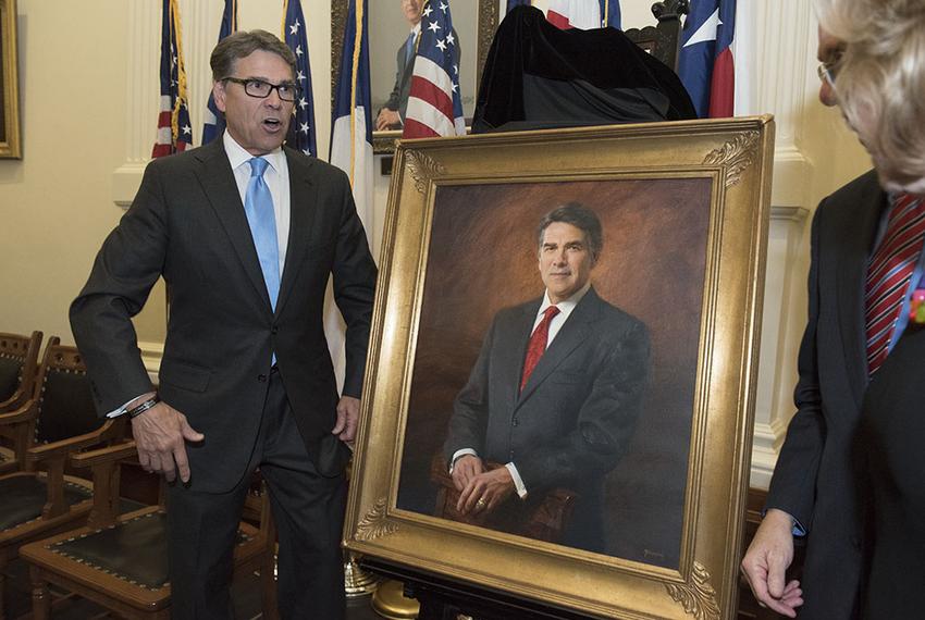 Former Texas Gov. Rick Perry posed with his official portrait before its hanging at the Texas Capitol on May 6, 2016.