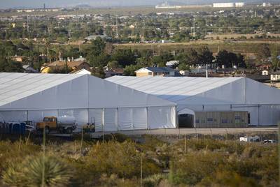 Tents erected next to Border Patrol station in El Paso are designed to hold up to 500 migrants.