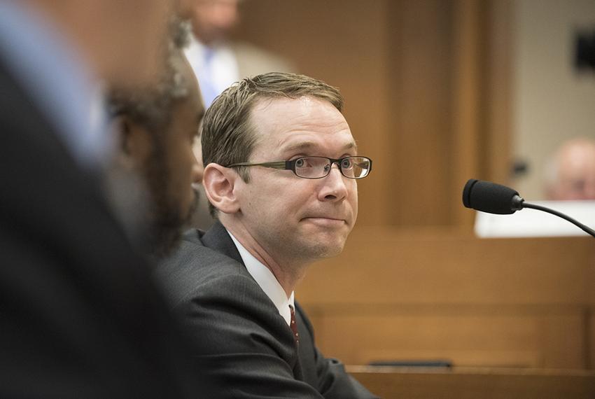 Texas Education Agency Commissioner Mike Morath testifies on school board issues before the Senate Committee on Education August 16, 2016.