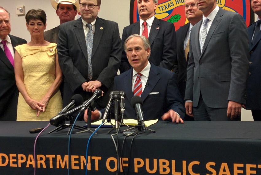 Gov. Greg Abbott marked the signing of a sweeping border security bill on June 9, 2015, at a Texas Department of Public Safety facility in Harris County.