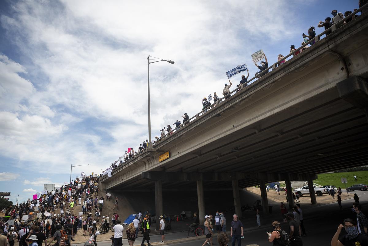 Hundreds of protesters met at the Austin Police Headquaerters in downtown Austin and proceeded to take over both sides of Interstate 35. The protest followed the deaths of George Floyd in Minneapolis, MN and Mike Ramos in Austin, both by police officers.