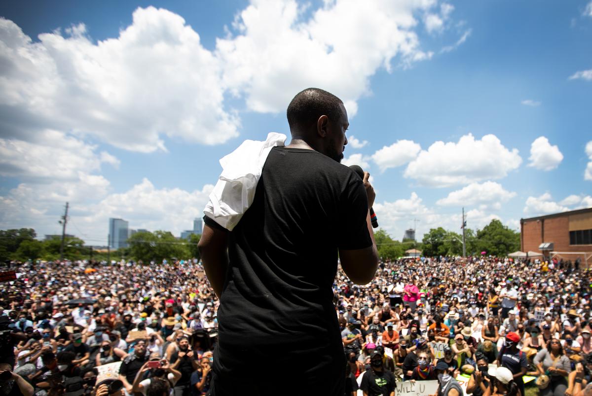 Austin Justice Coalition founder Chas Moore speaks to more than 5,000 people gathered at Huston-Tillotson University for Black Austin Rally & March For Black Lives on June 7, 2020.