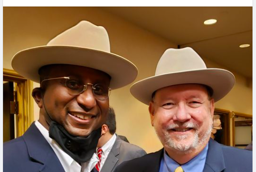 From left: Attorney Darrick Eugene and outgoing SBOE member Ken Mercer at the reception for Mercer and other departing State Board of Education members.