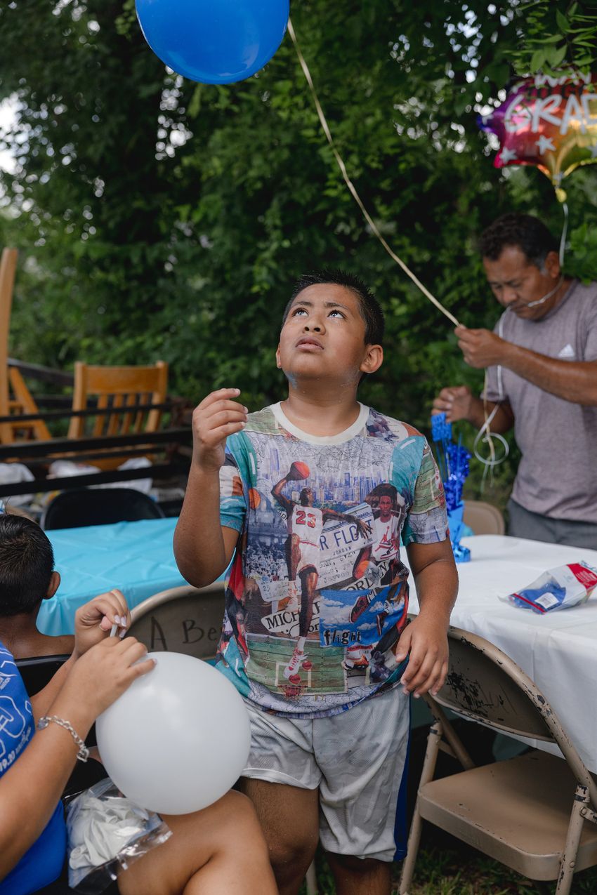 The Ávila family celebrate Jeremiah’s birthday with a waterslide in José’s backyard, Friday, June 6, 2025, in Houston.
(Lexi Parra for The Texas Tribune)