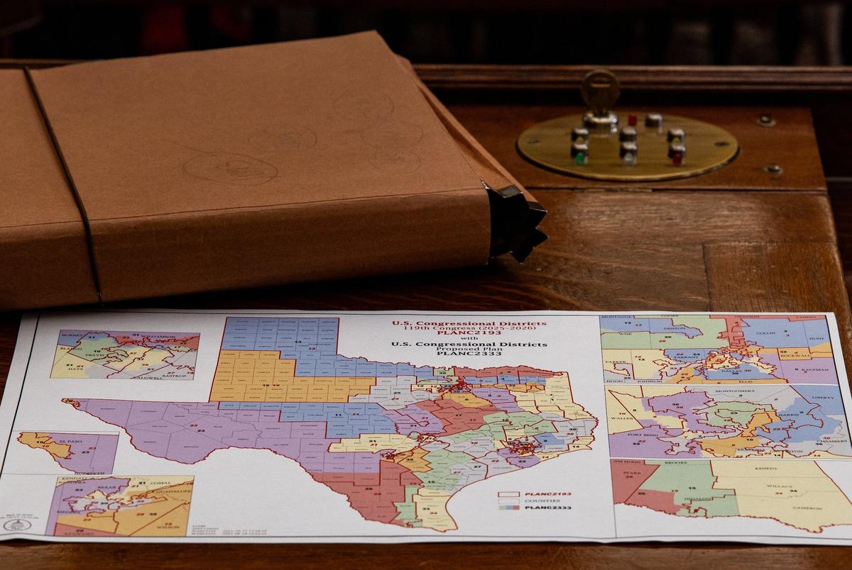 A map of the proposed changes to Texas congressional districts sits on a Texas House member’s desk on Aug. 20, 2025.