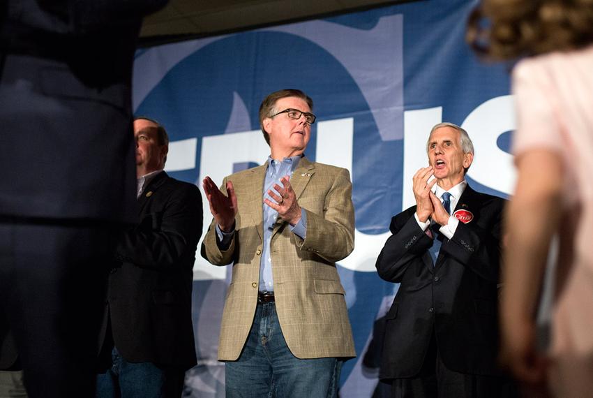 Texas Lieutenant Gov. Dan Patrick claps while Senator Ted Cruz speaking during his event in Columbia following  the Republican presidential primary, Saturday night, February 20, 2016.