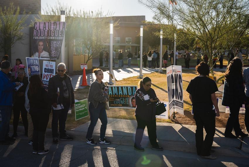 Voters wait in line to cast their ballots in the 2024 presidential election at the Esperanza Acosta Memorial Library. Voters waited in line in upwards of two hours in El Paso, Texas on November 5, 2024.