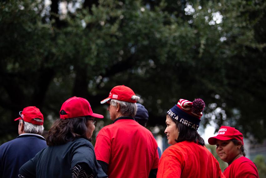 Diana Carrizales sports a Make America Great Again beanie while standing in line to get into the rally, in Houston on Oct. 22, 2018.