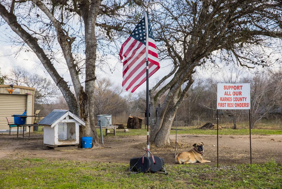 Local residents display signs supporting Karnes County first responders.