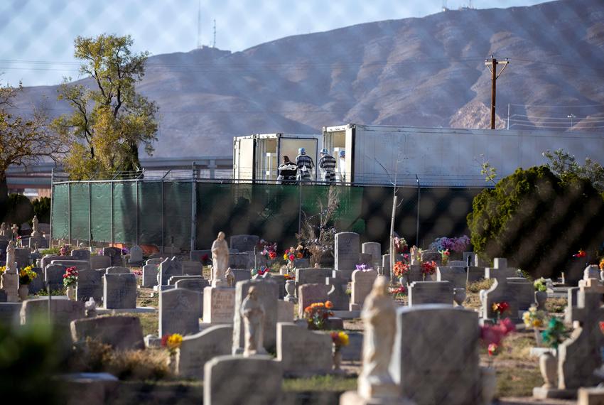 El Paso County inmates help move bodies to mobile morgue units outside the Medical Examiner's Office on Nov. 14, 2020.