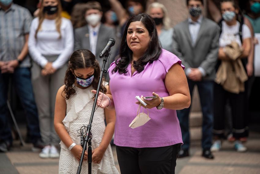 Lisa Stanton, with her daughter Maya, spoke at an event held by Equality Texas at the Capitol on April 14, 2021. The group had several speakers including parents of trans-children speaking against SB1646, which would bring possible charges against parents for helping their children with their gender identities.