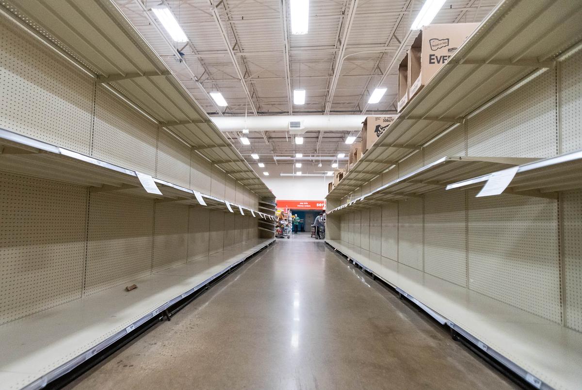 Shelves in the toilet paper aisle of the Hancock HEB are completely empty as Austinites rushed to stock up on essentials during the COVID19 outbreak in March. 