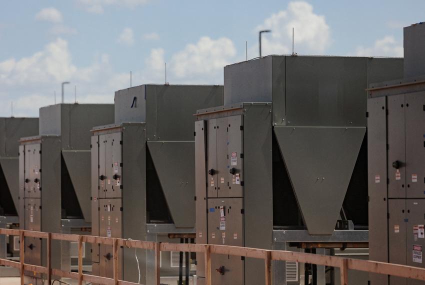 Chillers that cool water are connected to a data center building during a tour of the OpenAI data center in Abilene, Texas, U.S., September 23, 2025. Each building is estimated to need 1 million gallons of water that it will recycle.