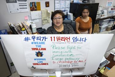 Woori Juntos Service coordinator Terry Yun live translates information provided by the ACLU into Korean during a Voting Know Your Rights Session at the Korean Community Center in Houston, TX, on Tuesday, Oct. 11, 2022.