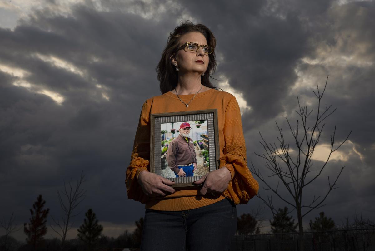 Tina Jones poses with a portrait of her husband Brian Jones in the pecan orchard he planted when they first moved onto their new land in Ennis. They watched the saplings grow into trees over 18 years, and during the fall of 2020 they for the first time grew enough pecans for Brian to make a pecan pie. Brian passed at the age of 52 on January 12 from COVID-19. 


Tina Jones identifies as female, Caucasian, non-latino.