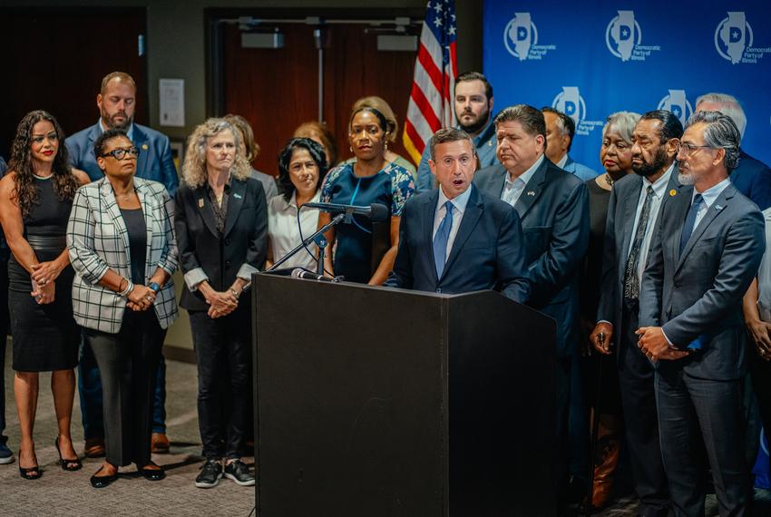 Democratic National Committee Chair Ken Martin speaks during a press conference surrounded by members of the Texas House Democratic Caucus at Painters District Council 30 in Aurora, Ill., on Tuesday, Aug. 5, 2025.