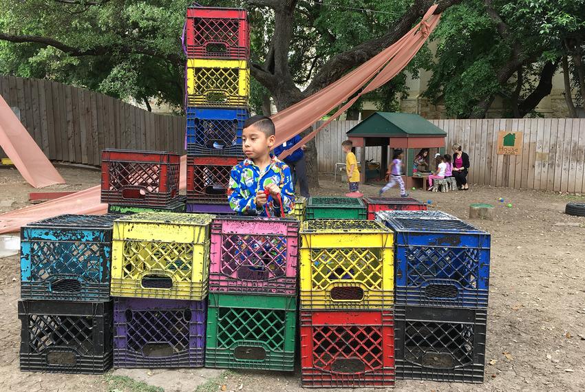 Students engage in creative activities on the playground at Pre-K 4 SA North Education Center in San Antonio, Texas.