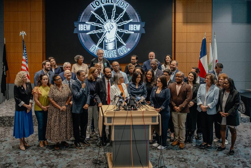Rep. Robin Kelly, D-Ill., center, stands with other Democratic members of Congress and Texas House Democrats during a press conference at IBEW Local 701 in Warrenville, Ill., on Monday, Aug. 4, 2025.