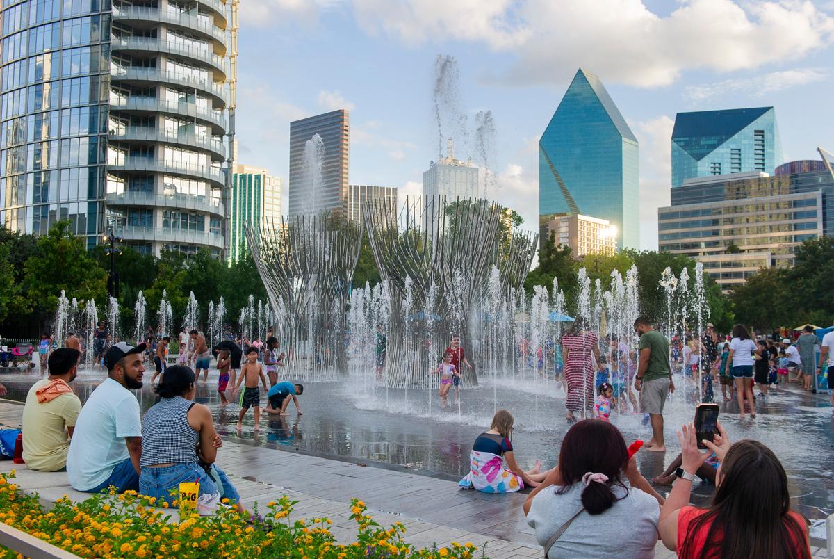 Children play at the Nancy Best Fountain at Klyde Warren Park in downtown Dallas on Sunday, July 27, 2025 in Dallas, Texas.