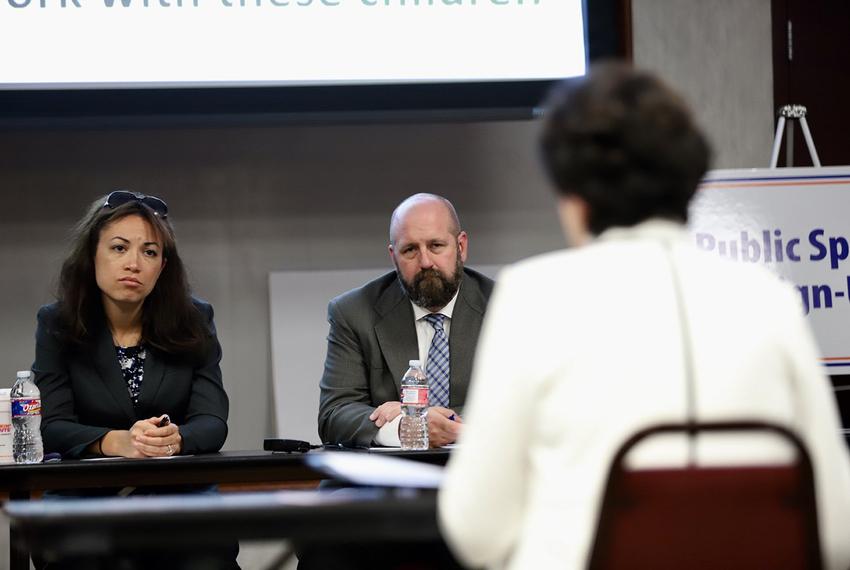 Texas Education Agency officials Penny Schwinn and Justin Porter listen to testimony at a hearing on special education in Richardson on April 16, 2018.