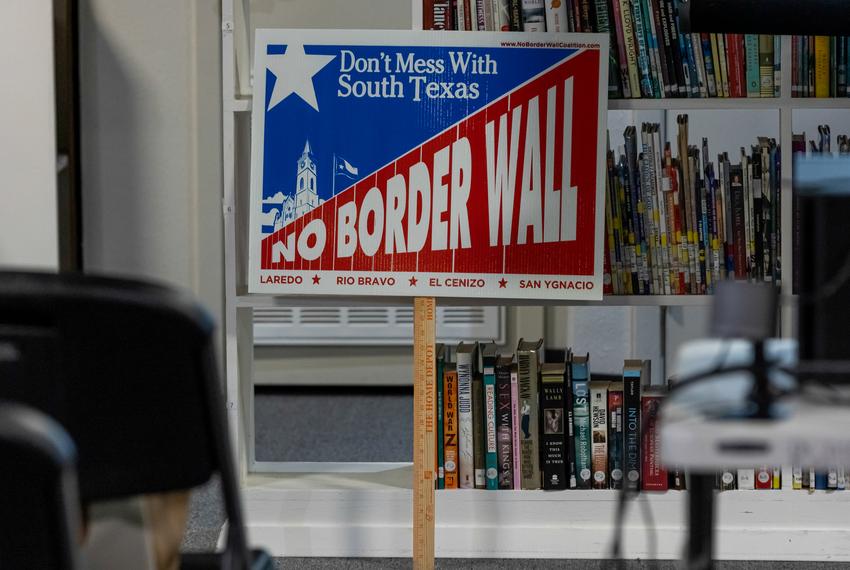 A “No Border Wall” sign at the No Border Wall Coalition’s emergency border wall town hall in El Cenizo on Feb. 15, 2023.