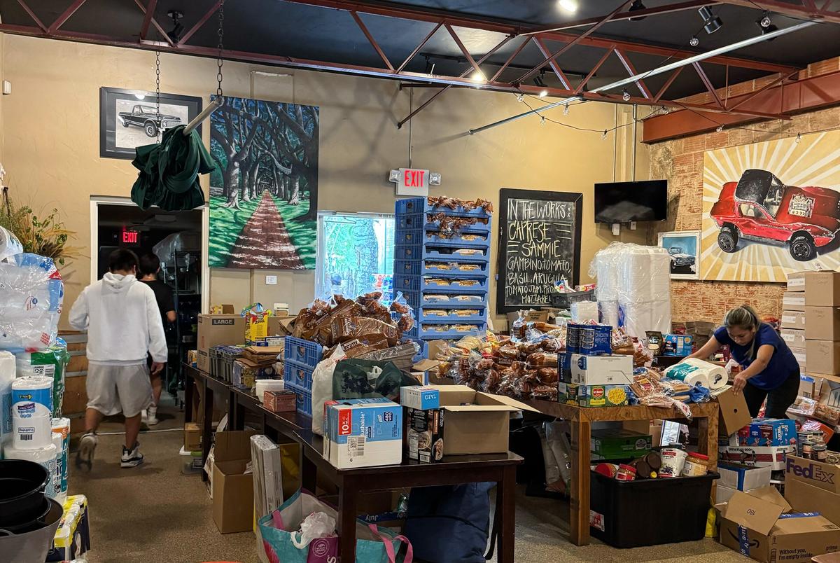 Donated materials pile up inside Grape Juice, a local business in downtown Kerrville, on July 12, 2025.