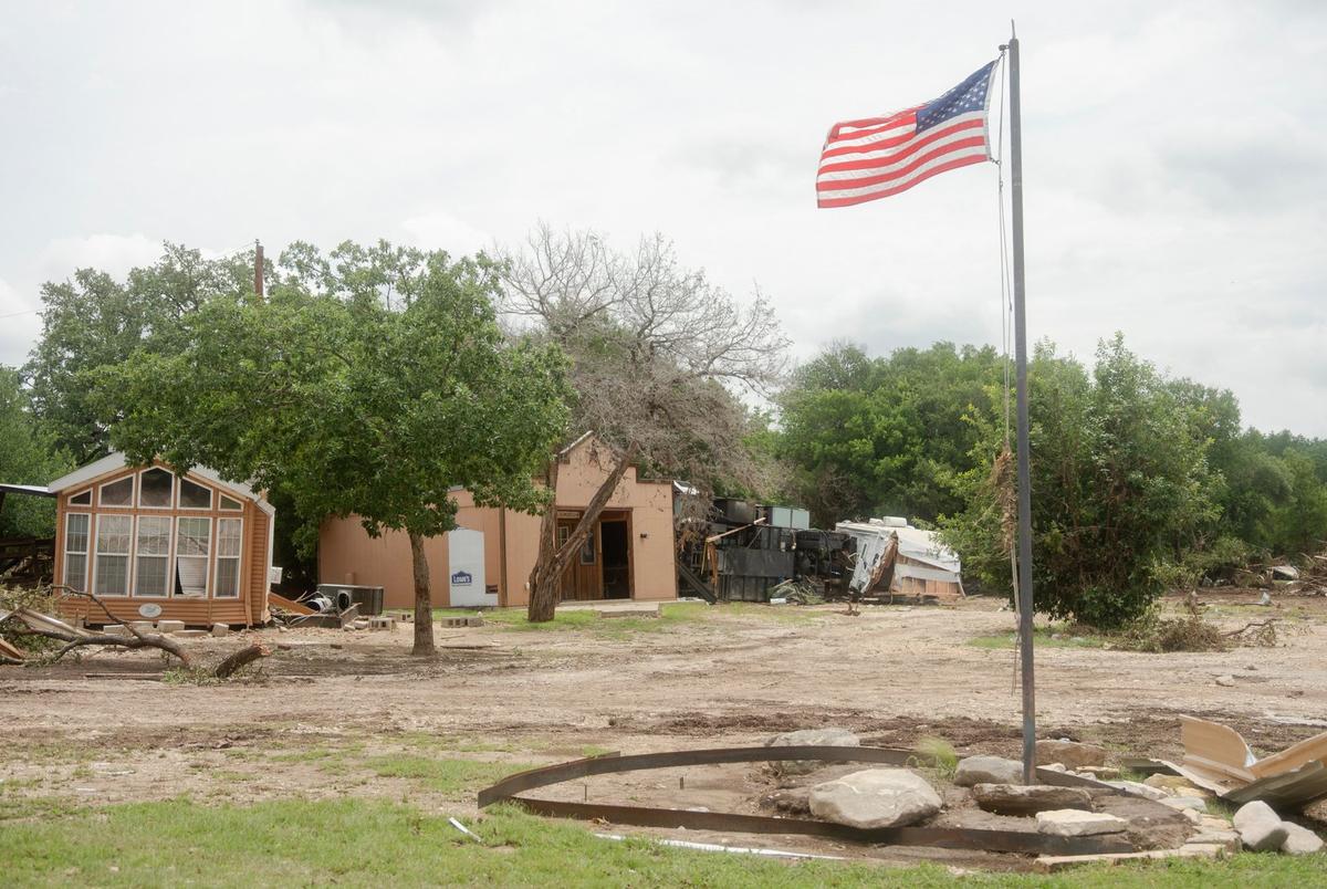 Damaged cabins seen along the river in Ingram on Monday July7, 2025.